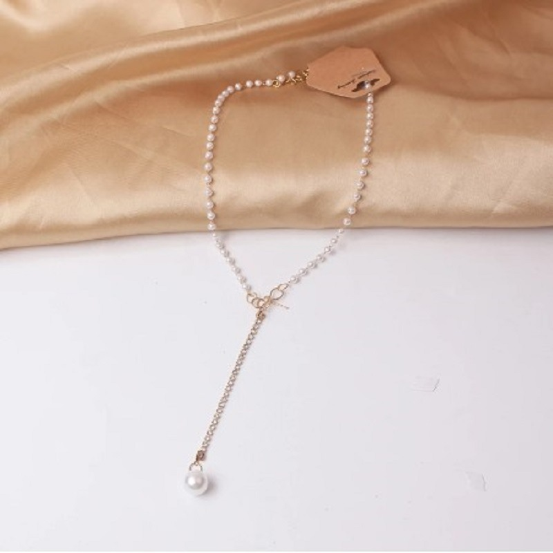 Graceful Bow & Pearl Tassel Necklace – Elegant Alloy Jewelry for Women